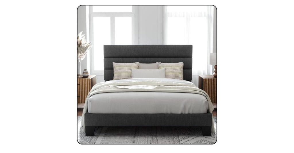 Modern upholstered platform bed with a soft fabric headboard for a luxury bedroom.